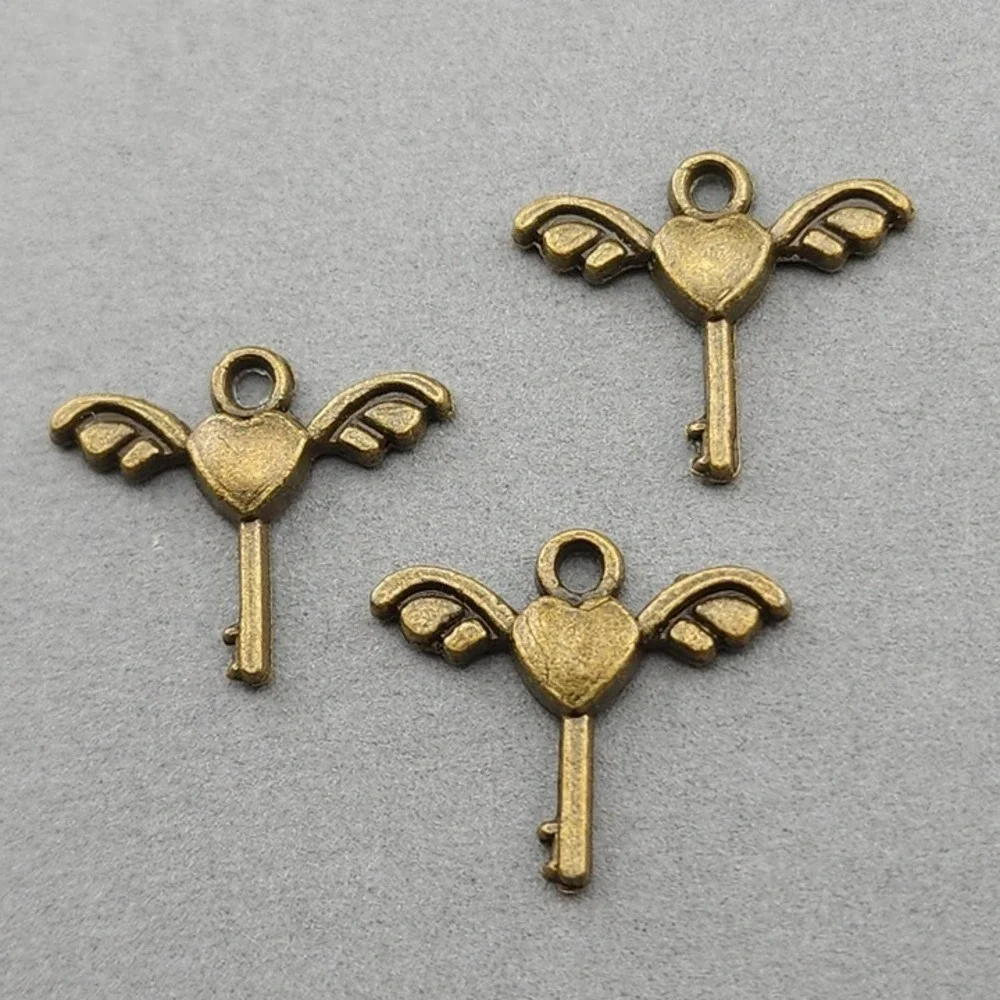 12pcs‎ Key Charms Bronze Tone Metal wing heart key